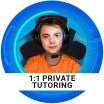boy wearing headset in front of blue background wearing orange shirt