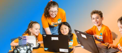 children coding with trainer